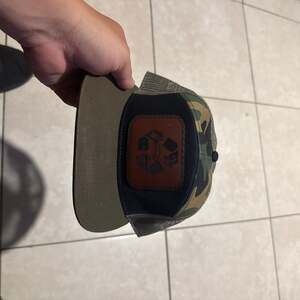 Camo Script Trucker Hat,